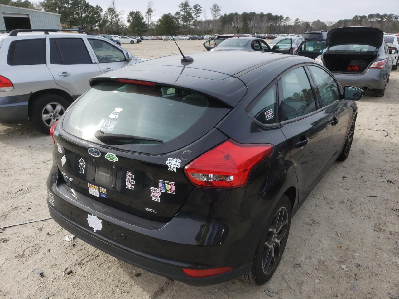 Photo 4 from auction – 2018 FORD FOCUS SEL with VIN 1FADP3M2XJL319907