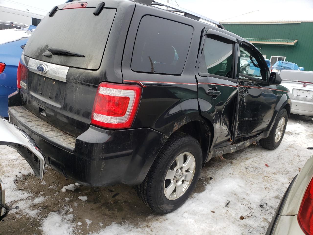 Photo 4 from auction – 2011 FORD ESCAPE LIM with VIN 1FMCU9E72BKB28237