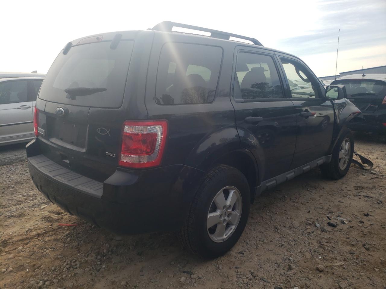 Photo 4 from auction – 2010 FORD ESCAPE XLT with VIN 1FMCU0D77AKB28567