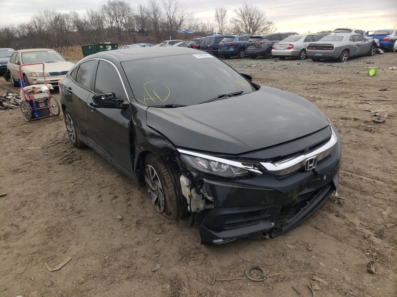 HONDA CIVIC EX 2018 with VIN 2HGFC2F76JH504259 - Photo from auction