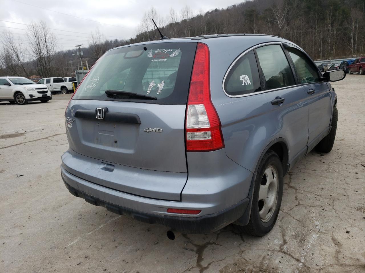 Photo 4 from auction – 2011 HONDA CR-V LX with VIN 5J6RE4H30BL035504