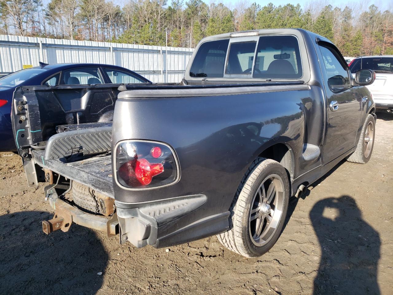 Photo 4 from auction – 2004 FORD F150 SVT L with VIN 2FTRF07354CA09362