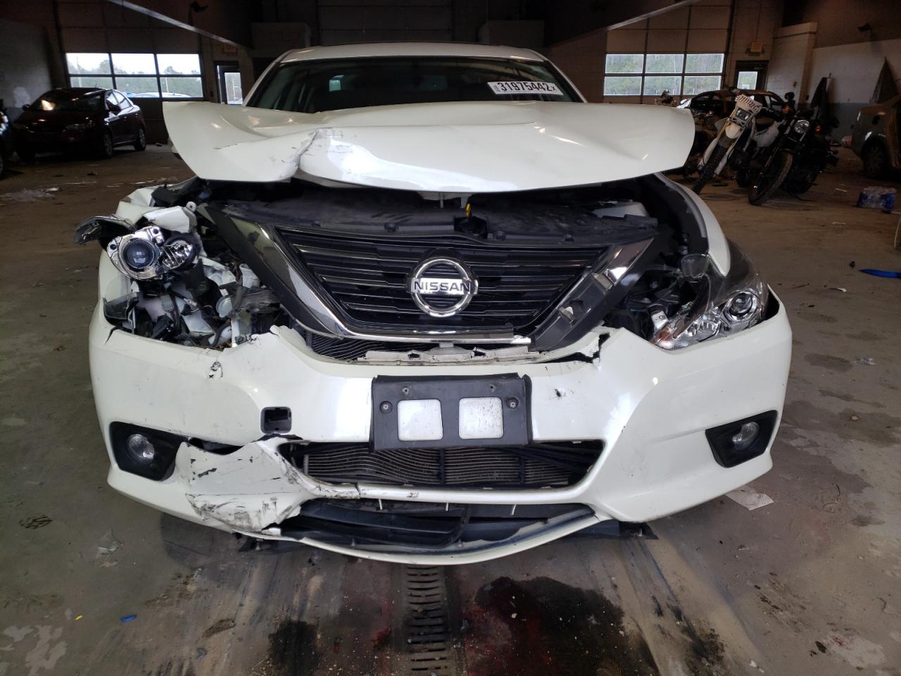 Photo 7 from auction – 2016 NISSAN ALTIMA 2.5 with VIN 1N4AL3AP6GC289828