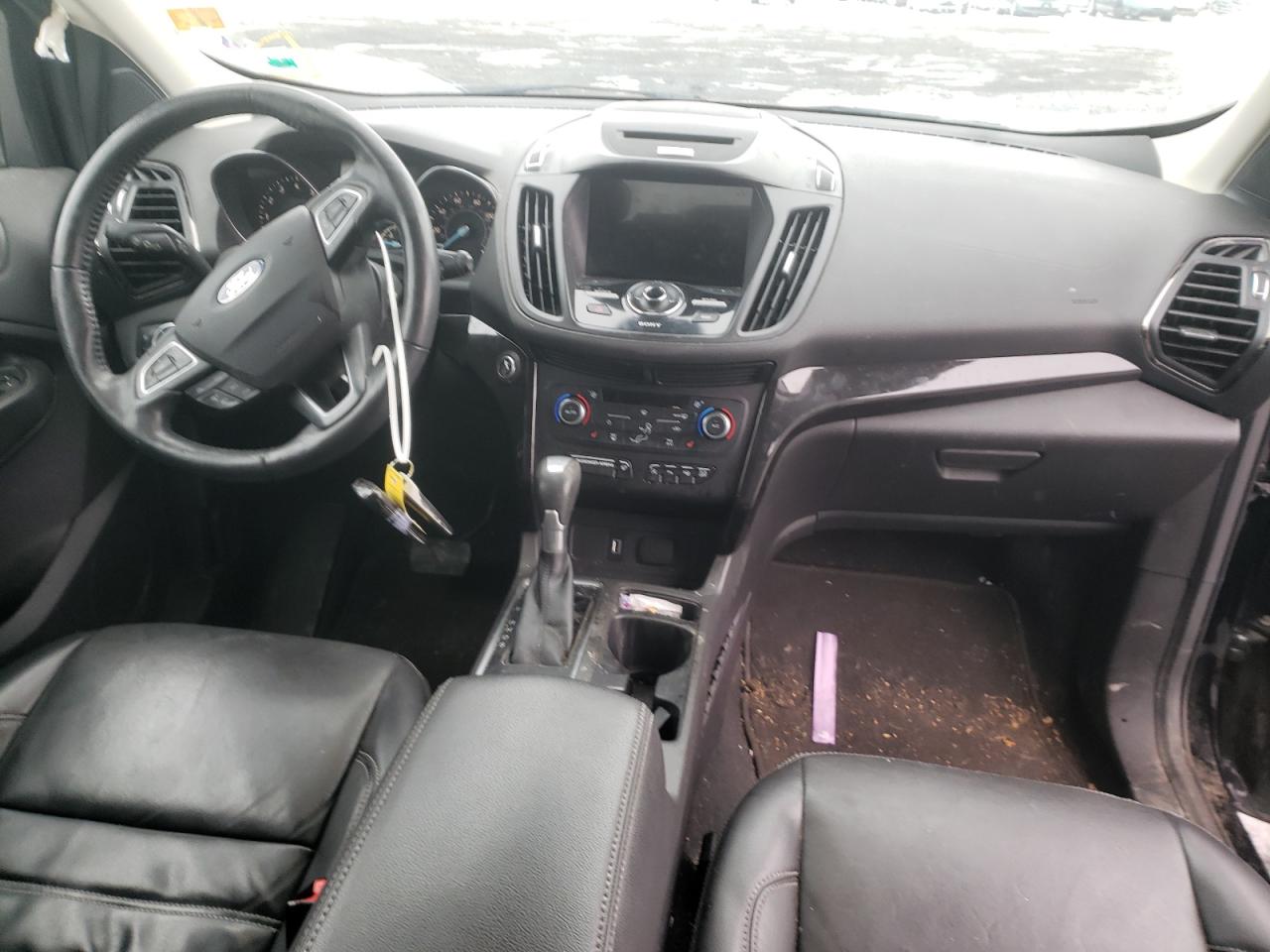 Photo 9 from auction – 2017 FORD ESCAPE TIT with VIN 1FMCU9J98HUA60000