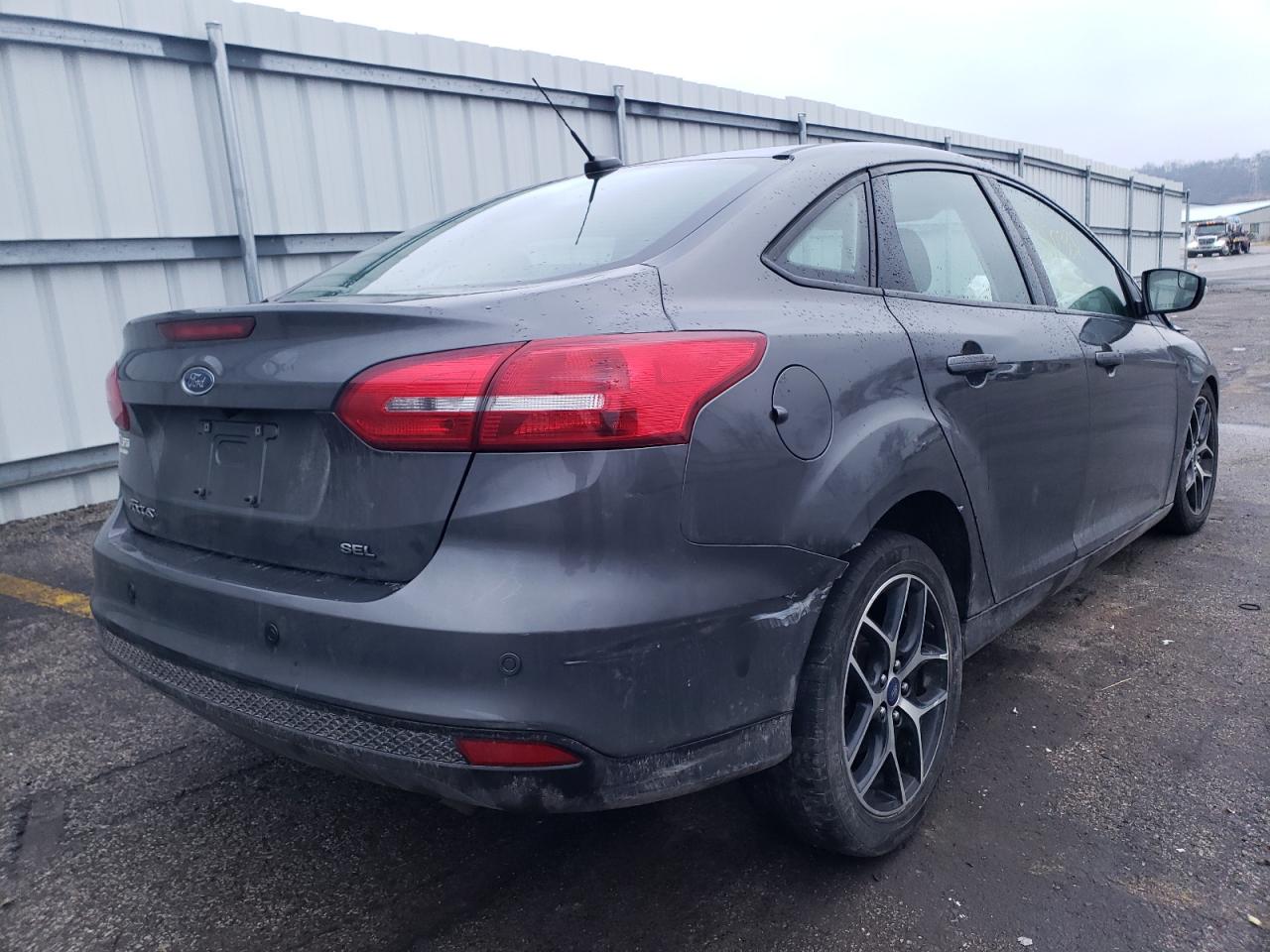 Photo 4 from auction – 2017 FORD FOCUS SEL with VIN 1FADP3H2XHL340079
