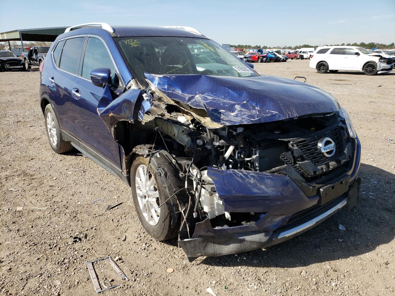 NISSAN ROGUE S 2017 with VIN 5N1AT2MT9HC746187 - Photo from auction
