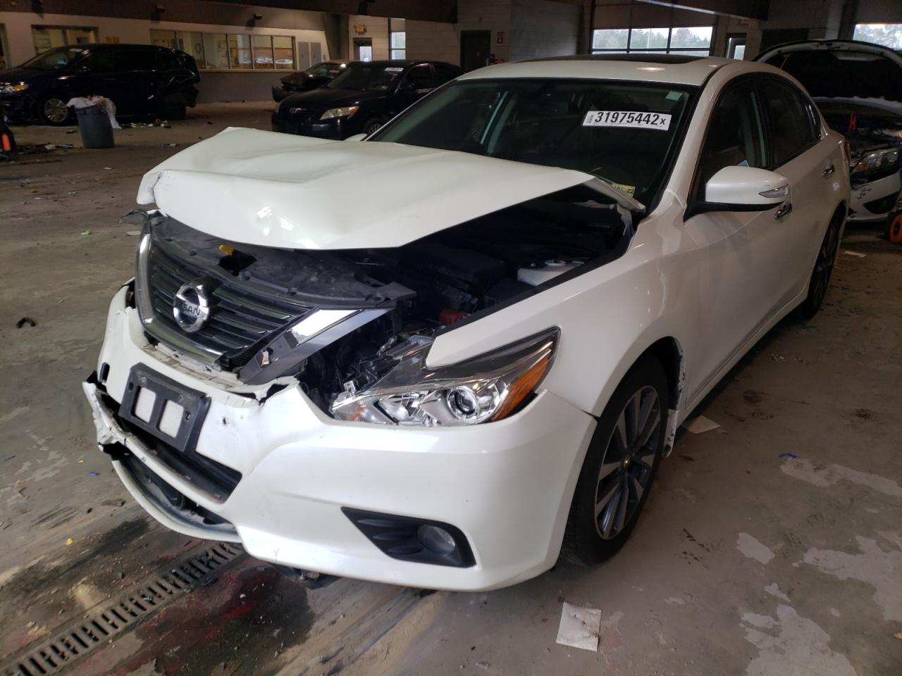 Photo 2 from auction – 2016 NISSAN ALTIMA 2.5 with VIN 1N4AL3AP6GC289828