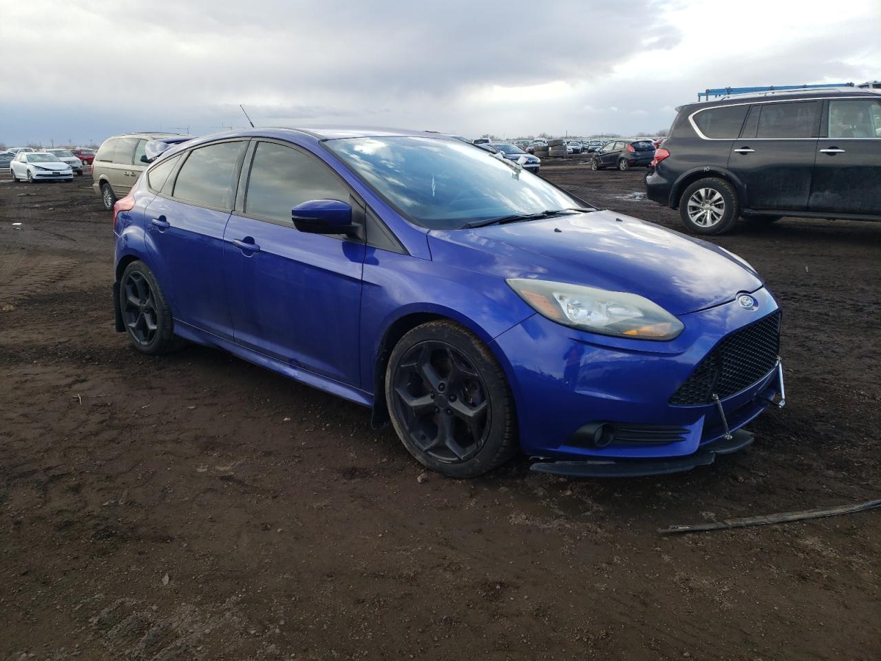 FORD FOCUS ST 2013 with VIN 1FADP3L96DL323326 - Photo from auction