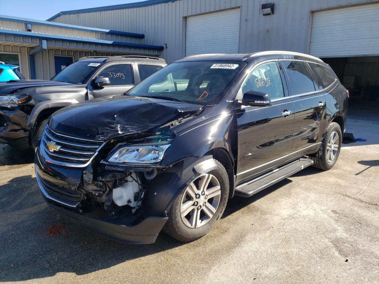 Photo 2 from auction – 2016 CHEVROLET TRAVERSE L with VIN 1GNKRHKD2GJ157568