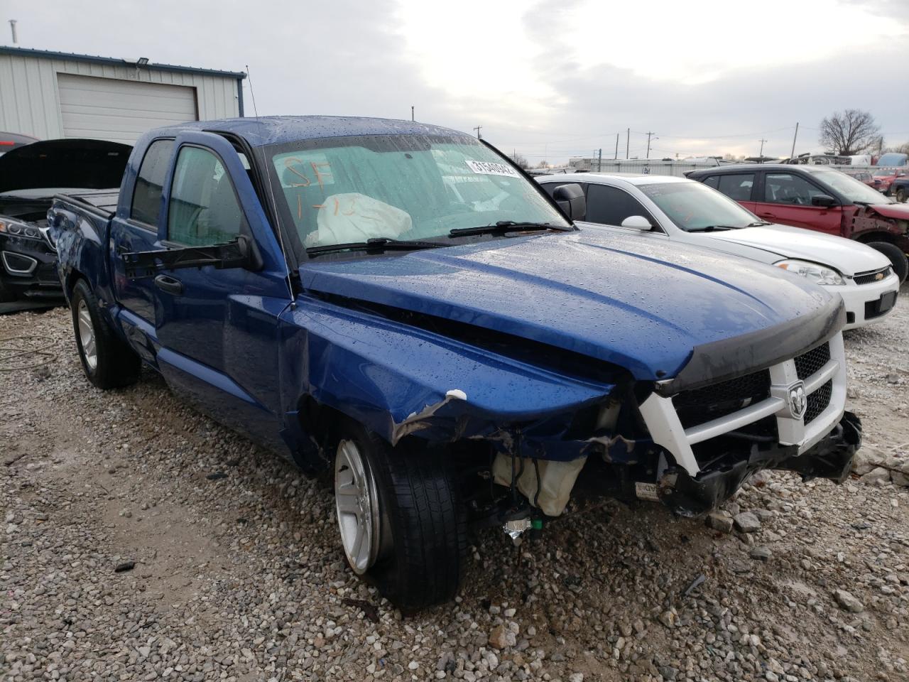 DODGE DAKOTA SLT 2011 with VIN 1D7RW3GK9BS521357 - Photo from auction