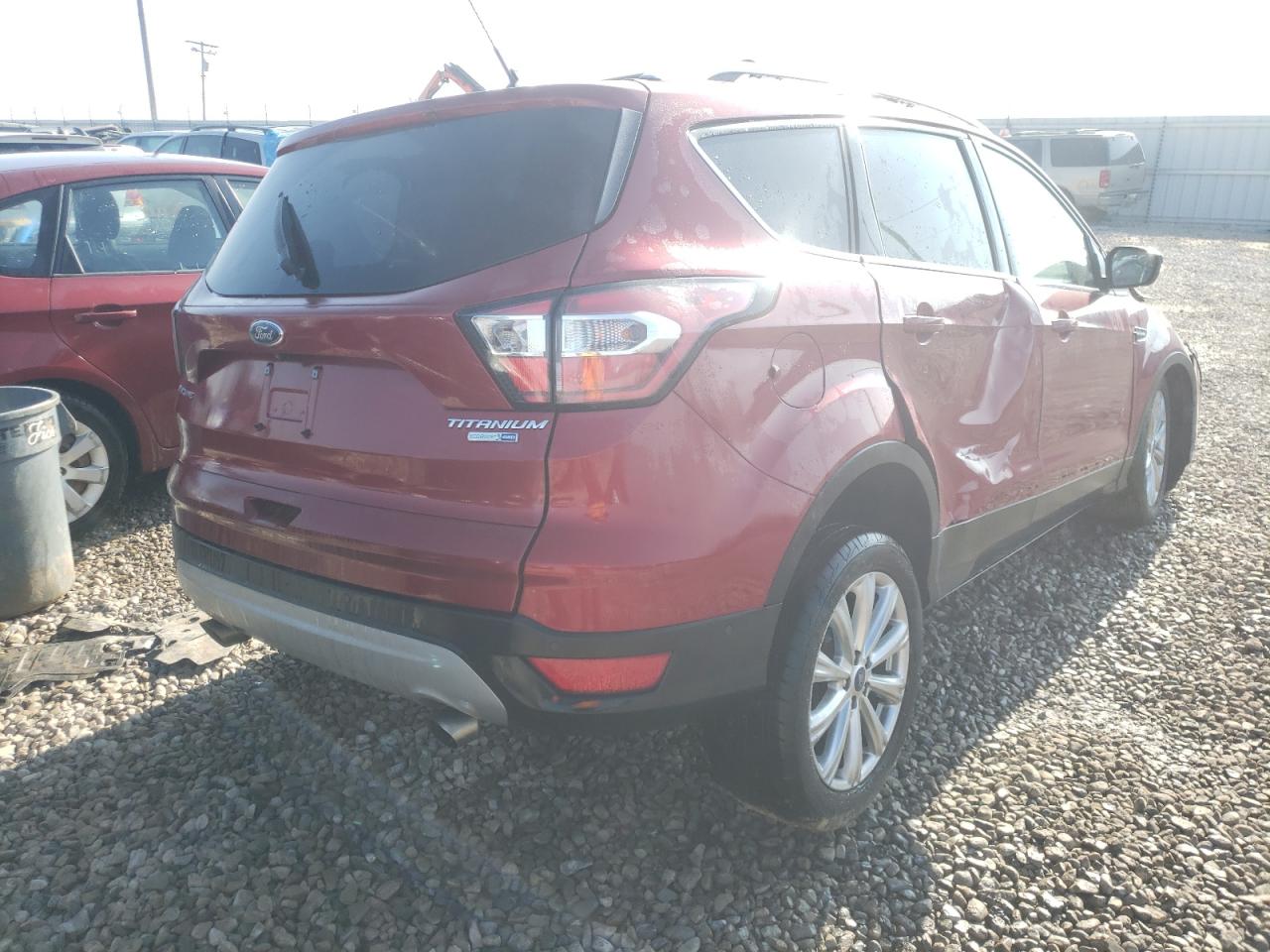 Photo 4 from auction – 2018 FORD ESCAPE TIT with VIN 1FMCU9J93JUC62331