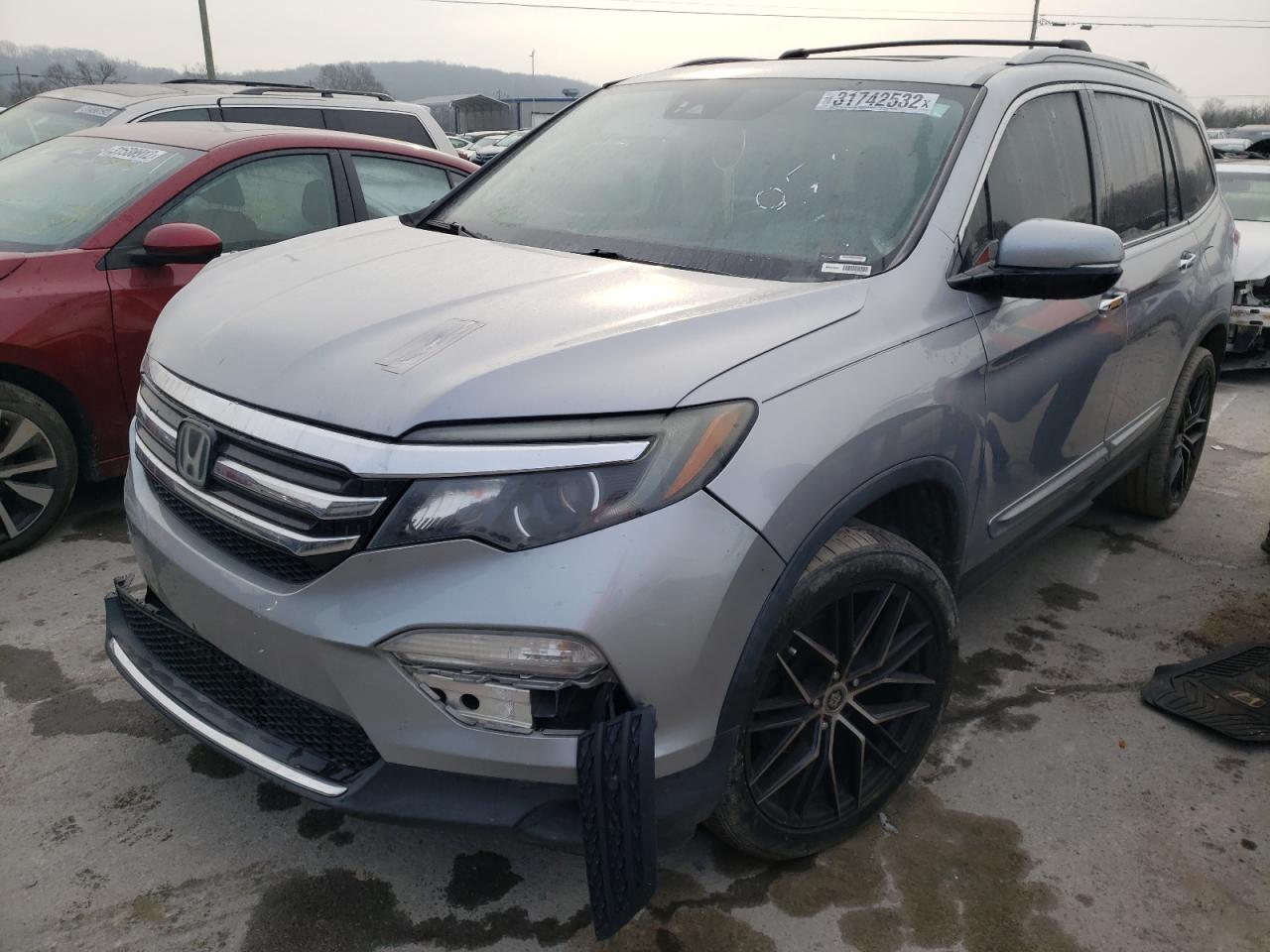 Foto 2 de la subasta – 2016 HONDA PILOT ELIT con VIN 5FNYF6H04GB050596