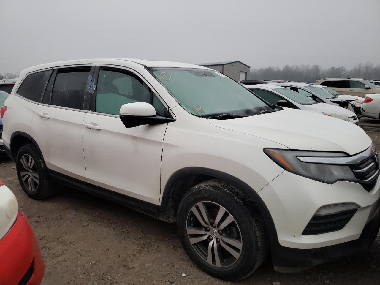 HONDA PILOT EXL 2016 with VIN 5FNYF6H54GB079026 - Photo from auction