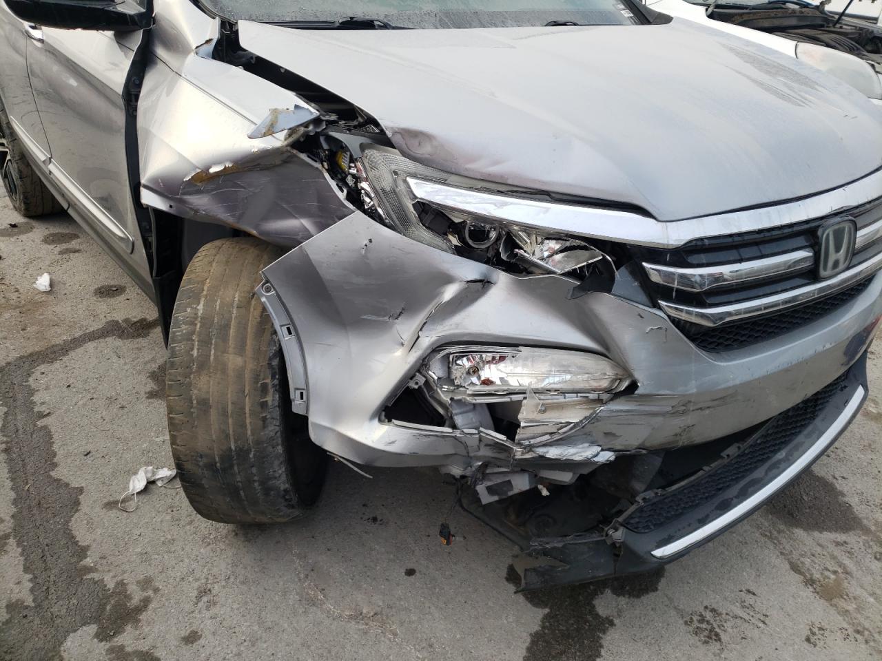 Foto 9 de la subasta – 2016 HONDA PILOT ELIT con VIN 5FNYF6H04GB050596