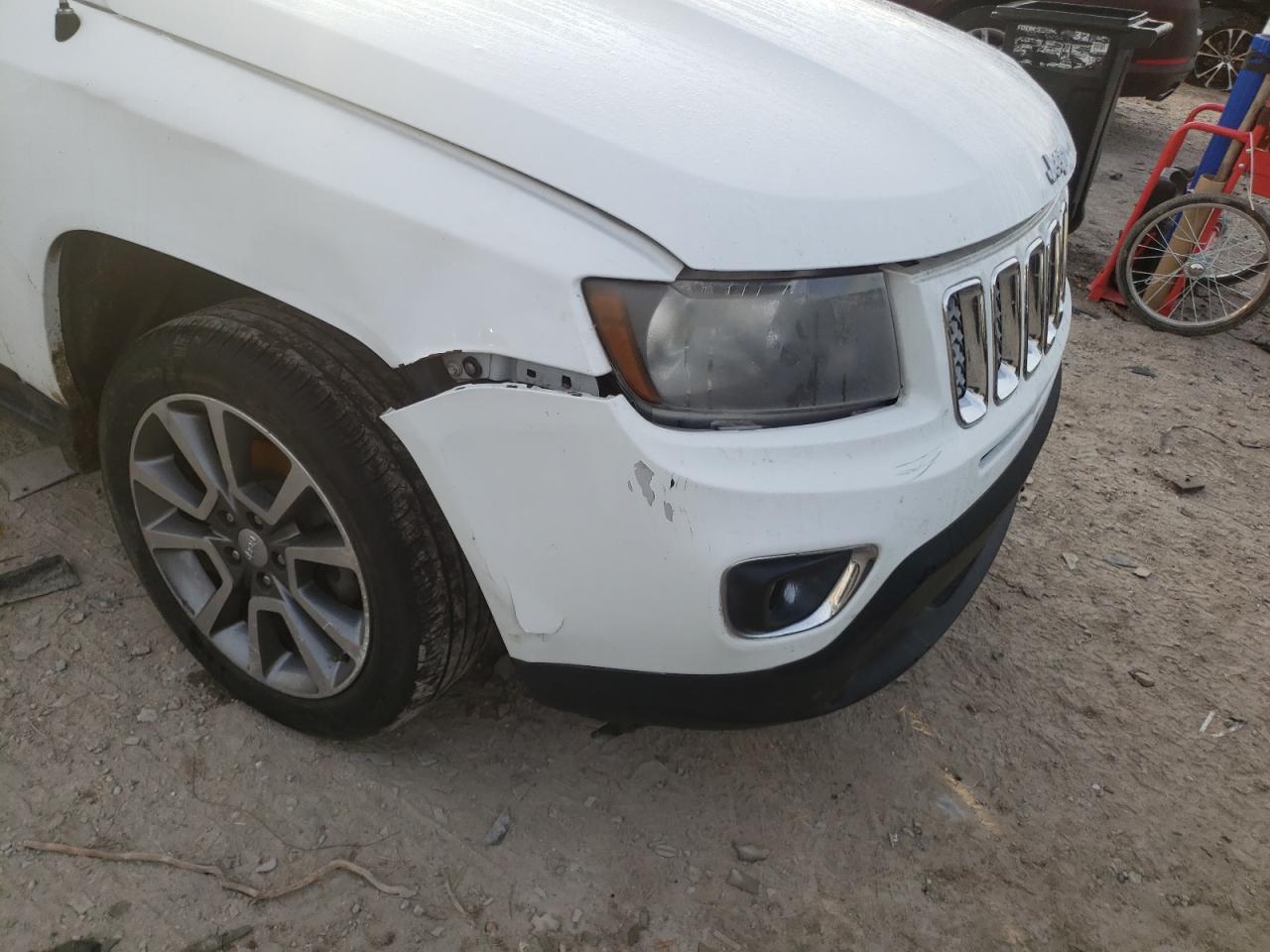 Photo 9 from auction – 2014 JEEP COMPASS LI with VIN 1C4NJCCB5ED662822