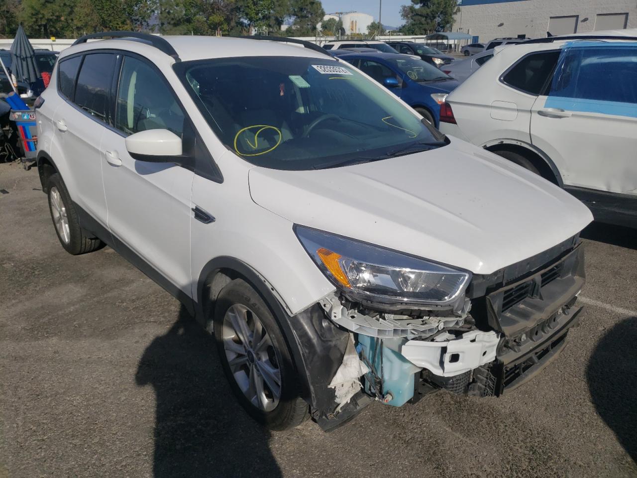 FORD ESCAPE SE 2018 with VIN 1FMCU0G99JUC63339 - Photo from auction