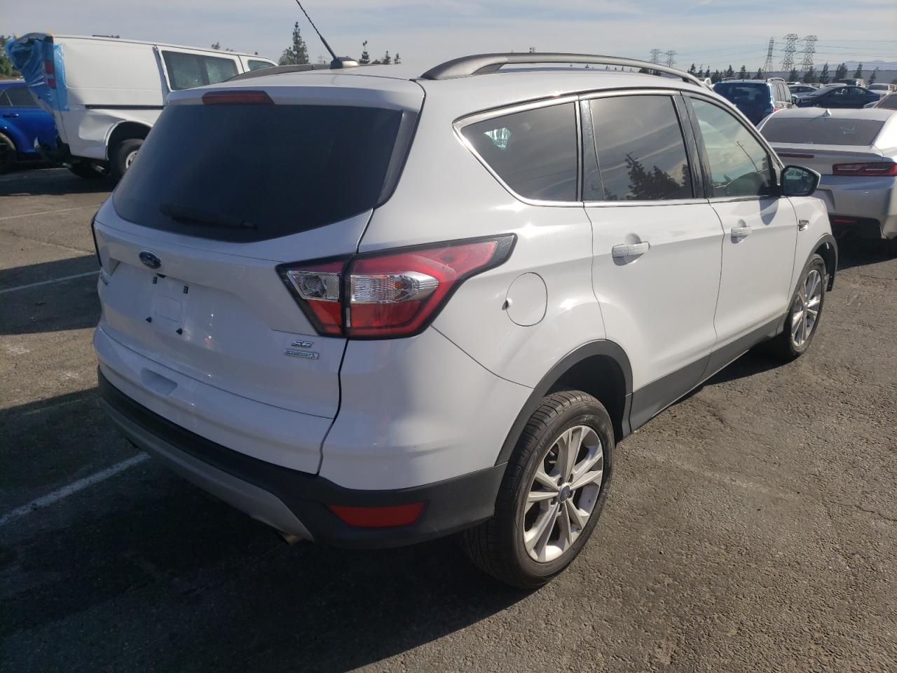 Photo 4 from auction – 2018 FORD ESCAPE SE with VIN 1FMCU0G99JUC63339