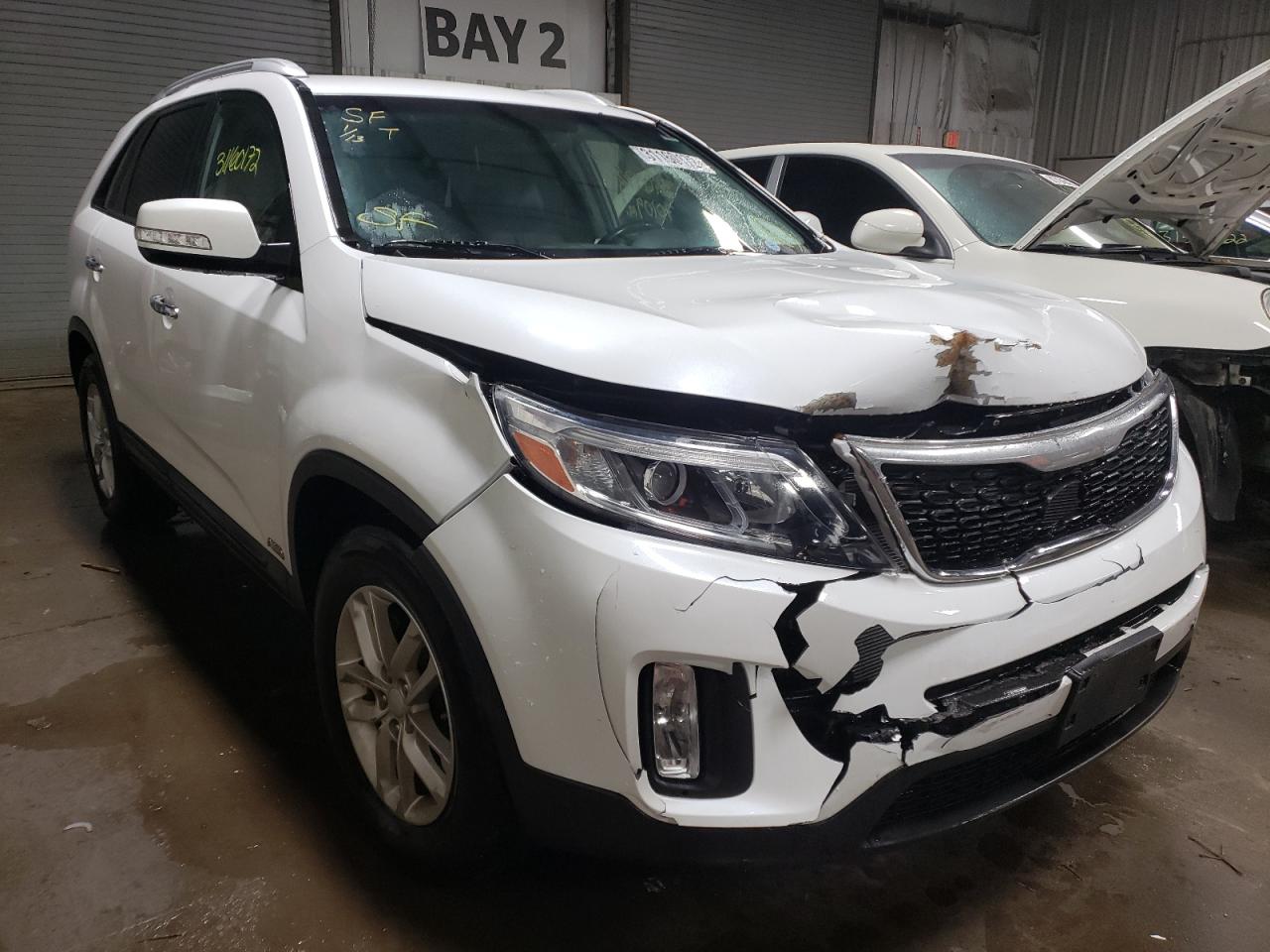 KIA SORENTO LX 2014 with VIN 5XYKTCA64EG442866 - Photo from auction