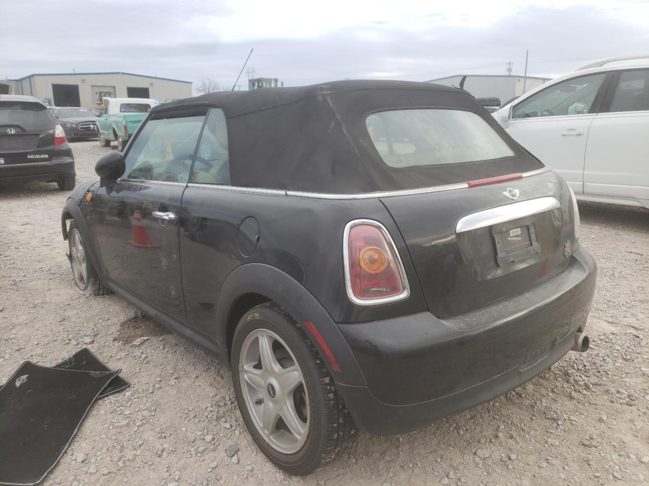 Photo 3 from auction – 2010 MINI COOPER with VIN WMWMR3C57ATU97612