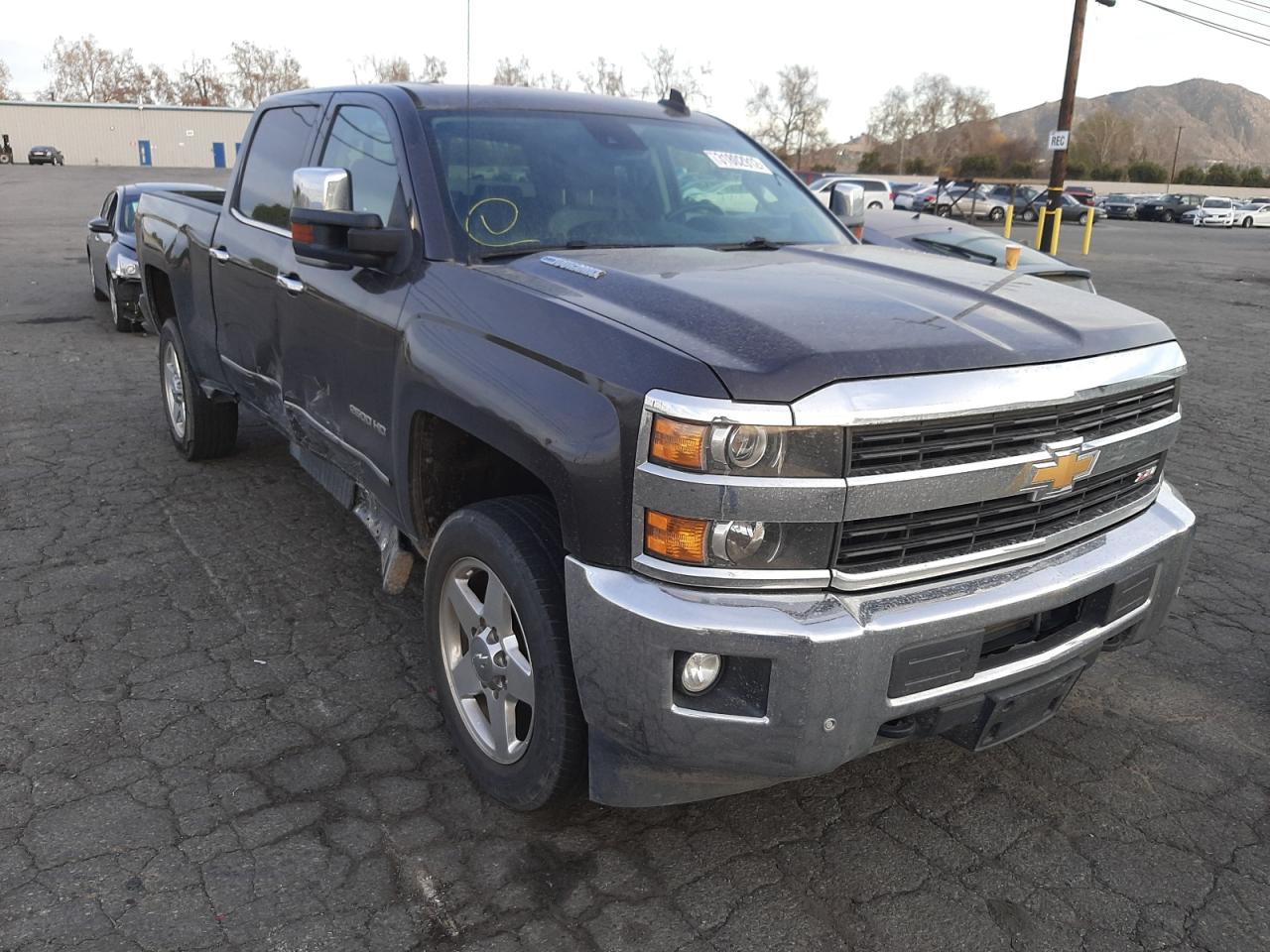 CHEVROLET SILVERADO 2015 with VIN 1GC1KWE8XFF629075 - Photo from auction