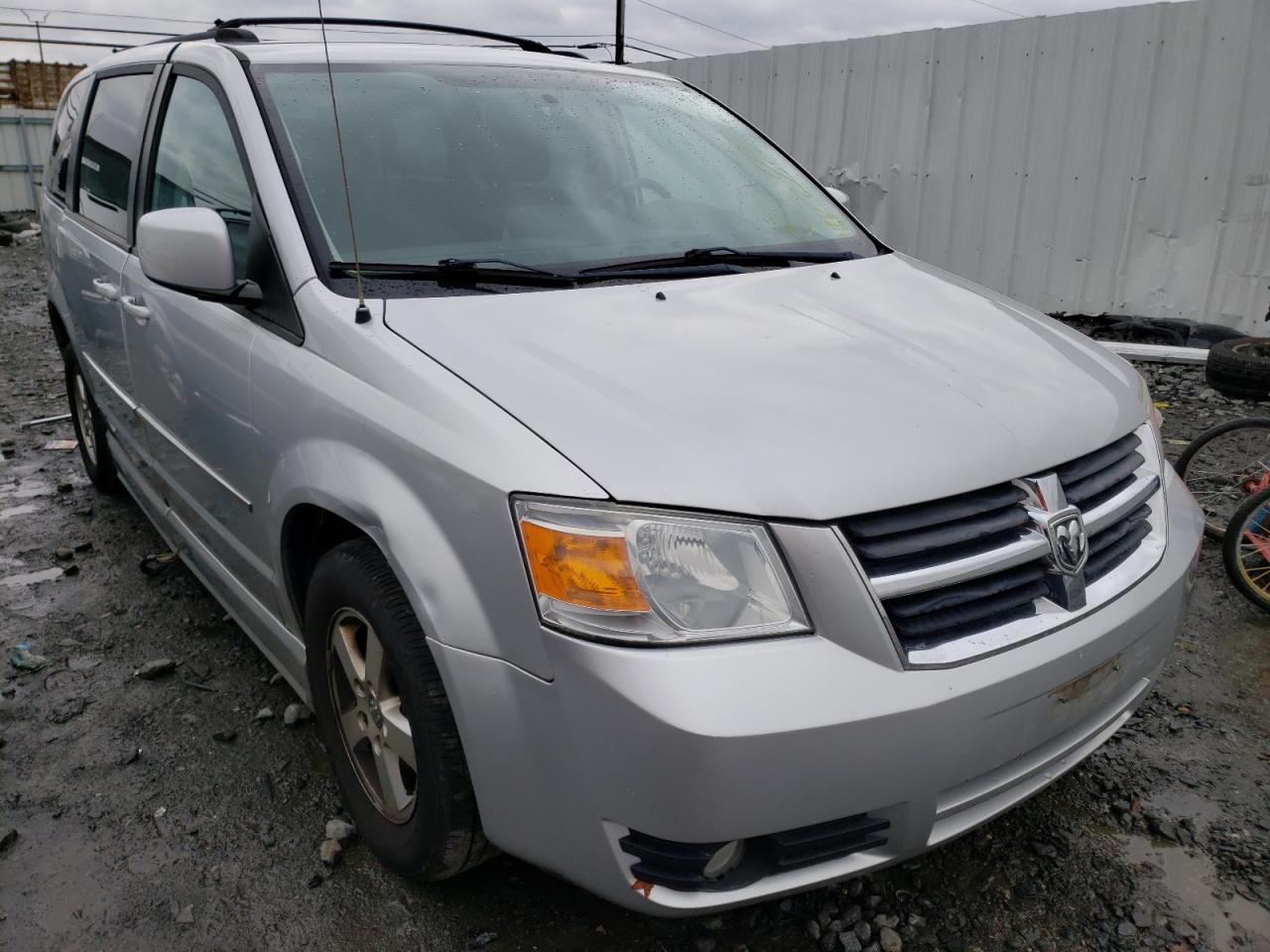 DODGE GRAND CARA 2010 مع رقم تعريف المركبة 2D4RN5D1XAR434557 - صورة من المزاد