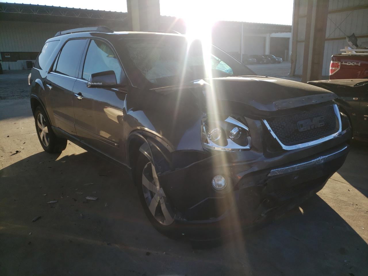 GMC ACADIA SLT 2010 with VIN 1GKLRMED1AJ162533 - Photo from auction