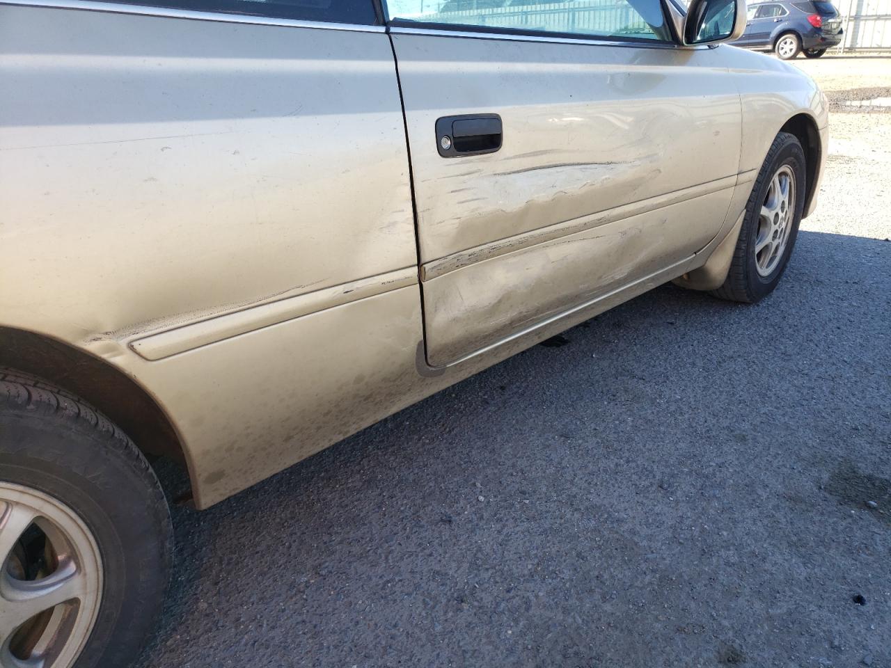 Photo 9 from auction – 2002 TOYOTA CAMRY SOLA with VIN 2T1CE22PX2C009883