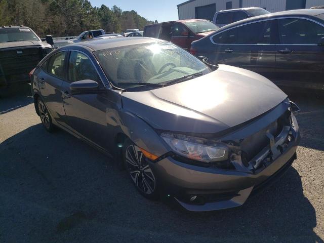 HONDA CIVIC EX 2018 with VIN JHMFC1F30JX016926 - Photo from auction