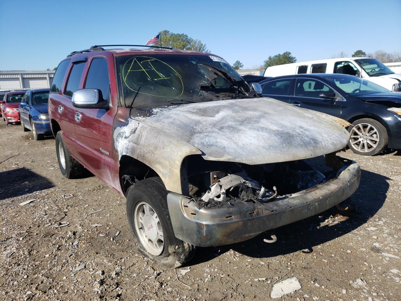 GMC YUKON 2001 with VIN 1GKEC13VX1R151164 - Photo from auction