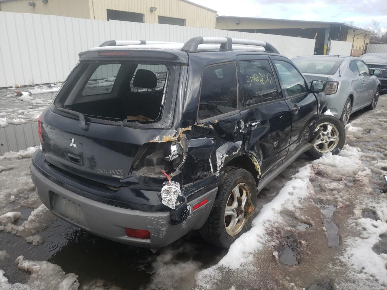 Photo 4 from auction – 2003 MITSUBISHI OUTLANDER with VIN JA4LZ31G03U113017
