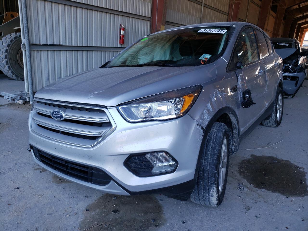 Photo 2 from auction – 2019 FORD ESCAPE SE with VIN 1FMCU0GD4KUB66877