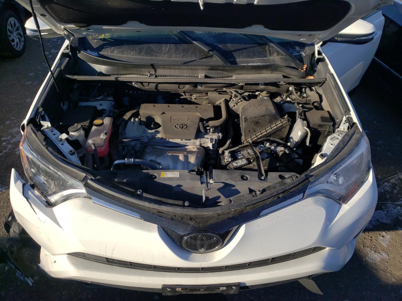 Photo 7 from auction – 2018 TOYOTA RAV4 LE with VIN 2T3ZFREV1JW473398