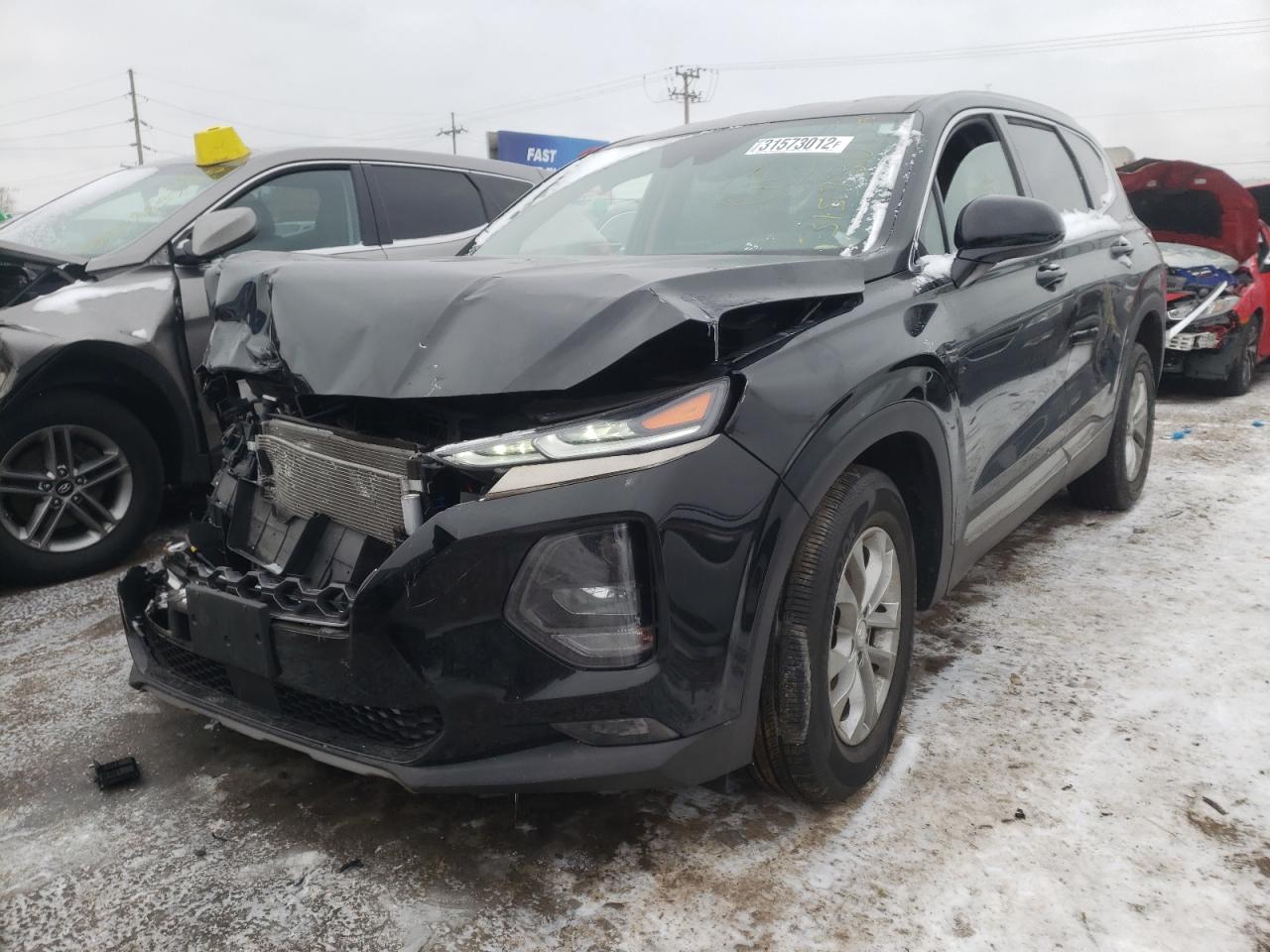 Photo 2 from auction – 2019 HYUNDAI SANTA FE S with VIN 5NMS3CAD3KH065981