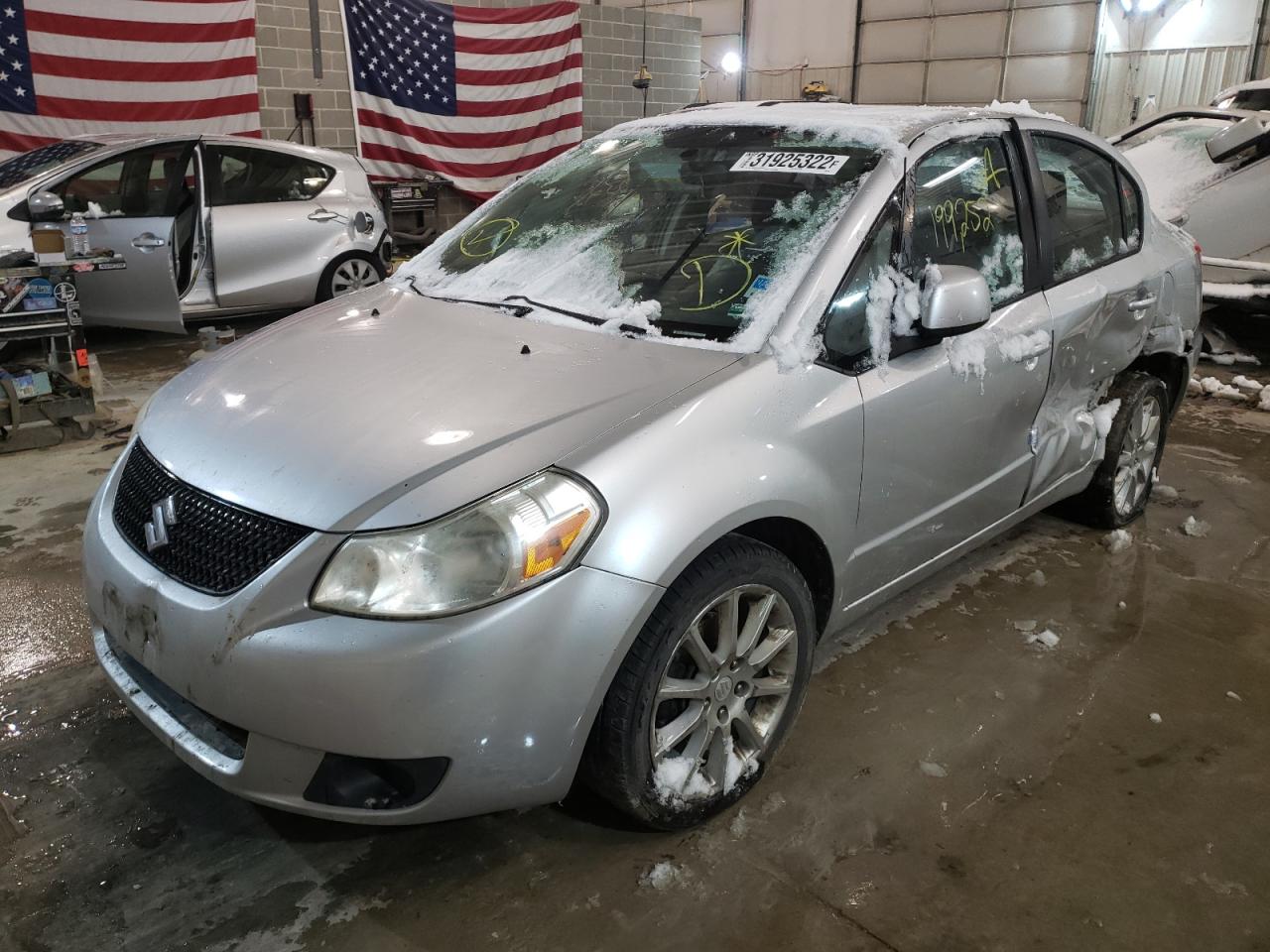 Photo 2 from auction – 2011 SUZUKI SX4 LE with VIN JS2YC5A21B6302202