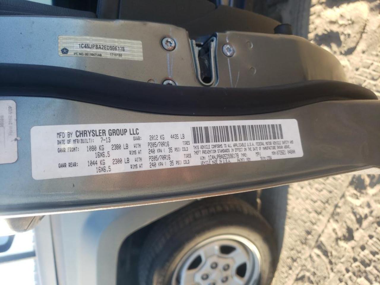 Photo 10 from auction – 2014 JEEP PATRIOT SP with VIN 1C4NJPBA2ED596178