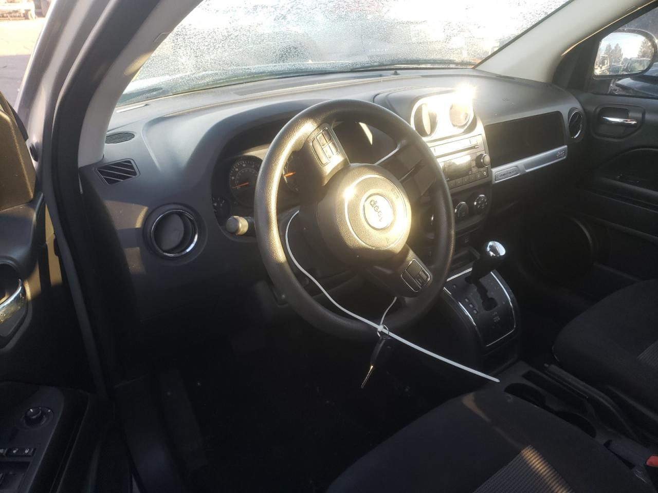 Photo 9 from auction – 2016 JEEP COMPASS SP with VIN 1C4NJDBB1GD662407
