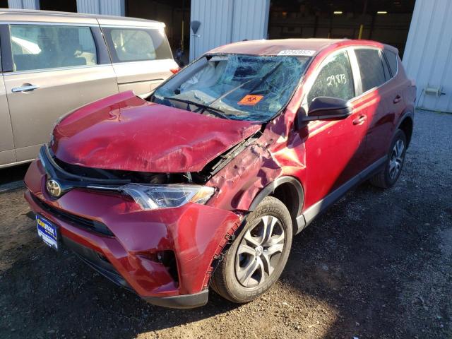 Photo 2 from auction – 2018 TOYOTA RAV4 LE with VIN 2T3BFREV1JW851012