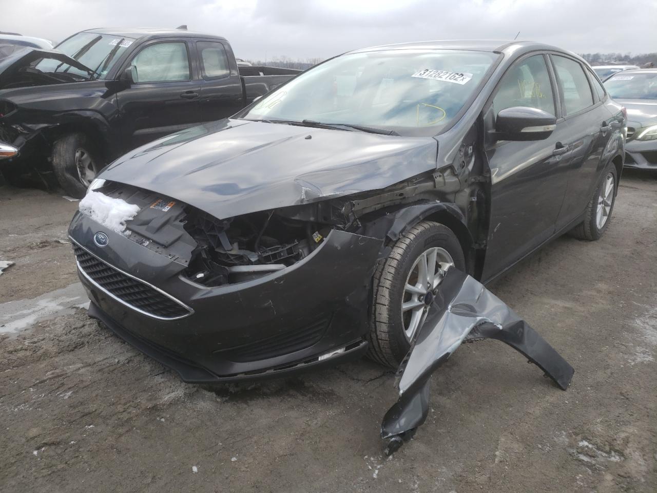 Photo 2 from auction – 2015 FORD FOCUS SE with VIN 1FADP3F28FL261381