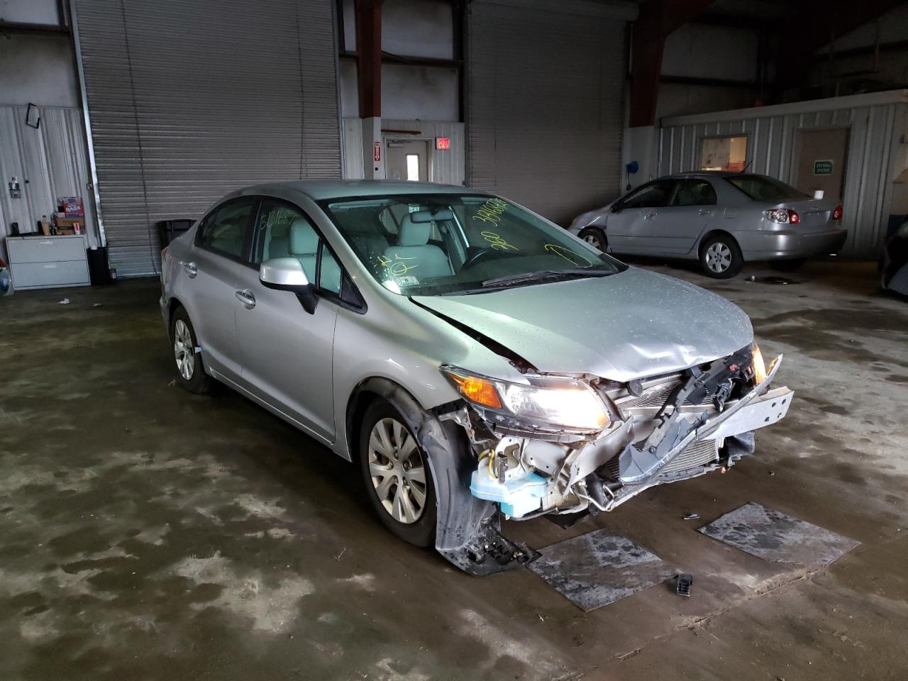 HONDA CIVIC LX 2012 with VIN 2HGFB2F52CH336334 - Photo from auction