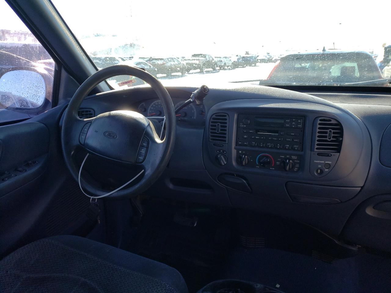 Photo 9 from auction – 1999 FORD F150 with VIN 2FTRX18L0XCA18377