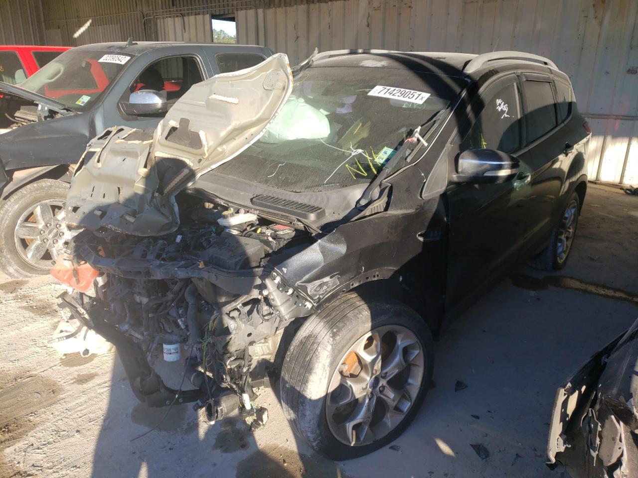 Photo 2 from auction – 2014 FORD ESCAPE TIT with VIN 1FMCU0J98EUB98014