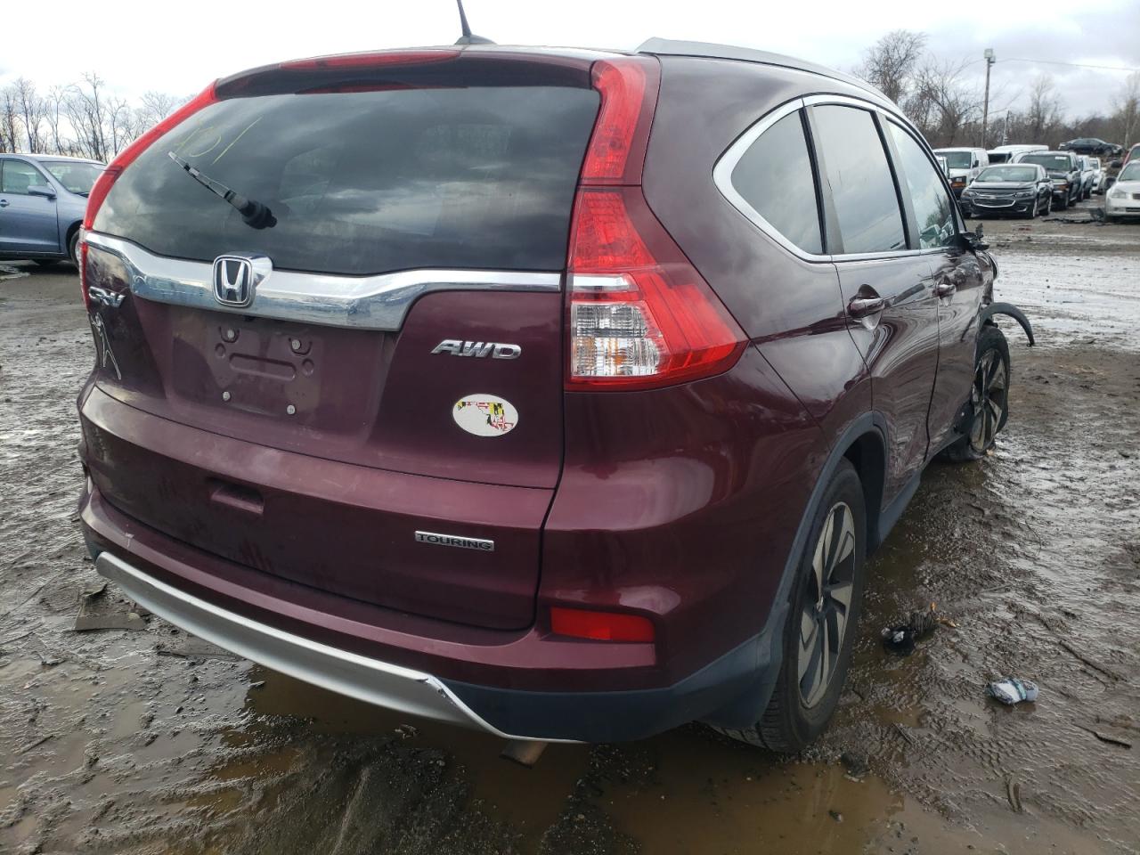 Photo 4 from auction – 2016 HONDA CR-V TOURI with VIN 5J6RM4H93GL007954