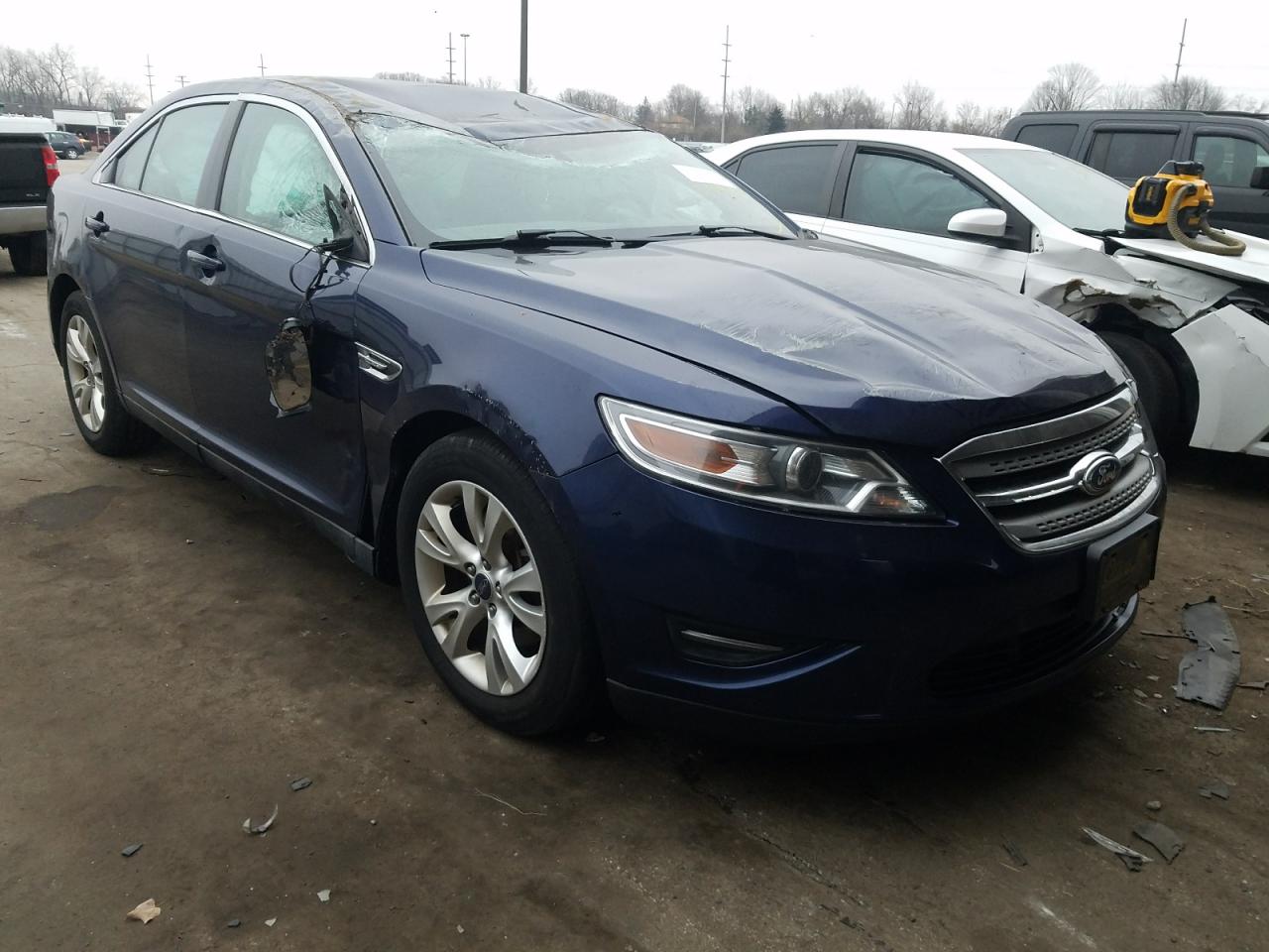 FORD TAURUS SEL 2011 with VIN 1FAHP2EWXBG152598 - Photo from auction