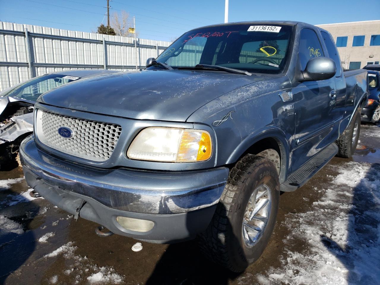 Photo 2 from auction – 1999 FORD F150 with VIN 2FTRX18L0XCA18377