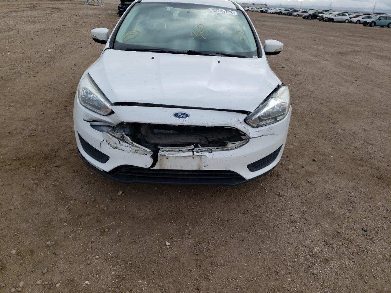 Photo 9 from auction – 2016 FORD FOCUS SE with VIN 1FADP3K2XGL235050