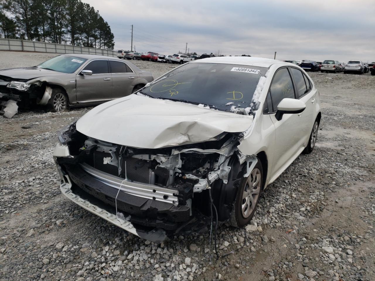 Photo 2 from auction – 2021 TOYOTA COROLLA LE with VIN JTDEPMAE4MJ164922