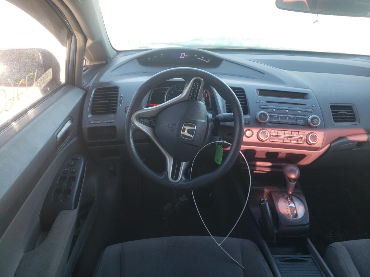 Photo 9 from auction – 2010 HONDA CIVIC DX with VIN 2HGFA1F22AH034784