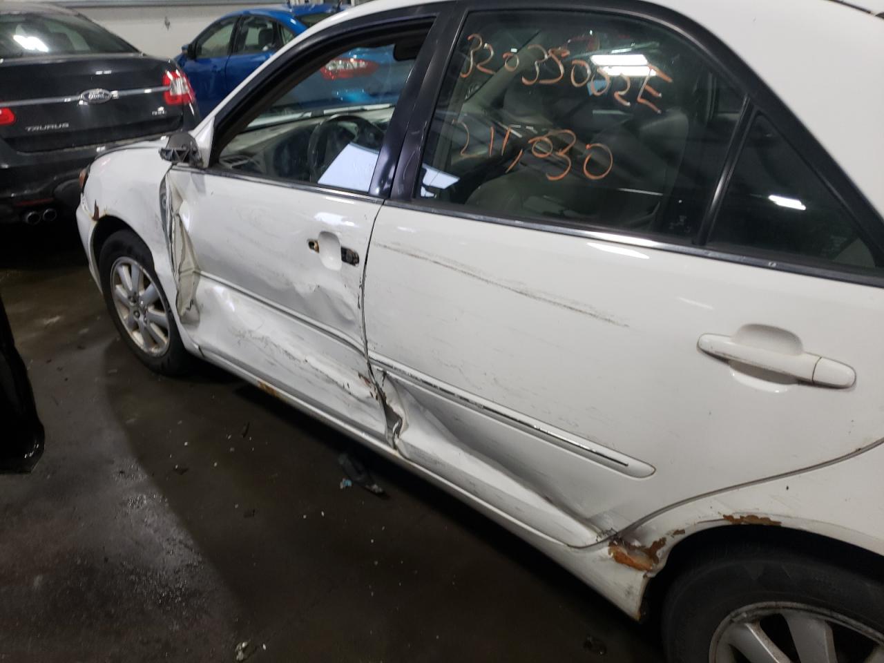 Photo 9 from auction – 2003 TOYOTA CAMRY LE with VIN 4T1BE30K73U227708