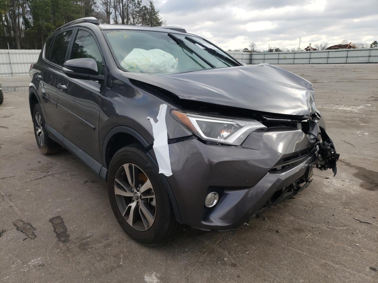TOYOTA RAV4 XLE 2017 with VIN 2T3WFREVXHW374706 - Photo from auction