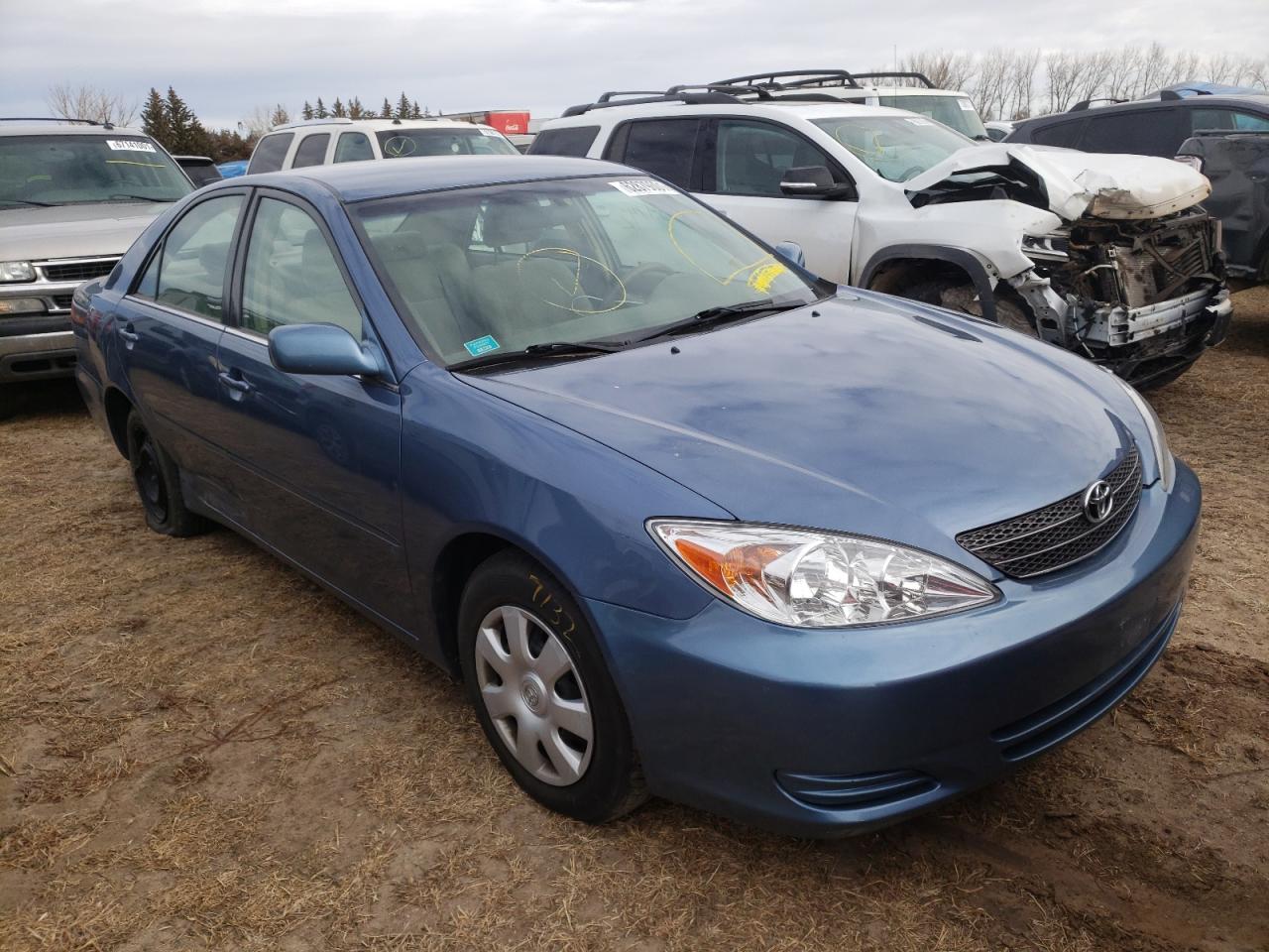 TOYOTA CAMRY LE 2003 with VIN 4T1BE32K73U677467 - Photo from auction